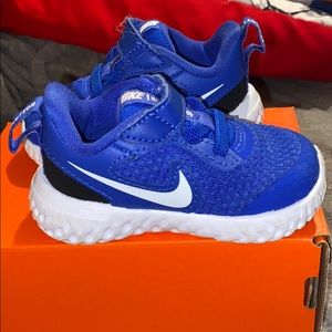Blue Nike Revolution 5